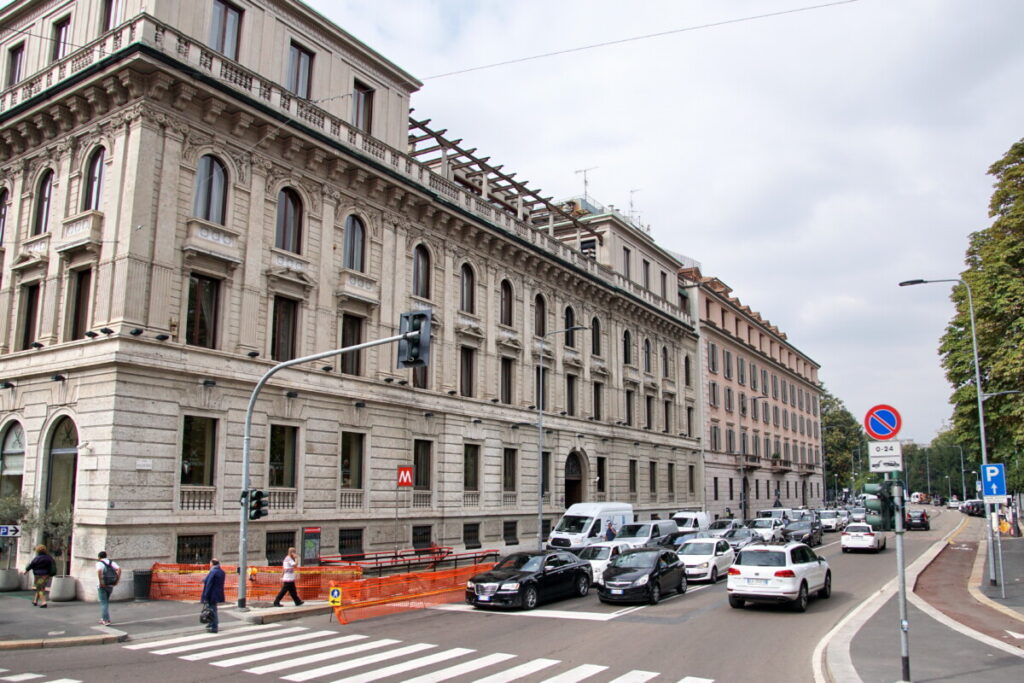Huge building structure of an accommodation and street view in Milan, Italy