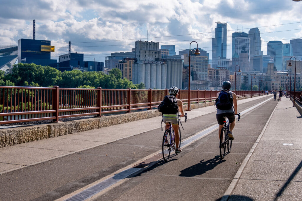 Cyclists in Stone Arch Bridge, Minneapolis, Minnesota