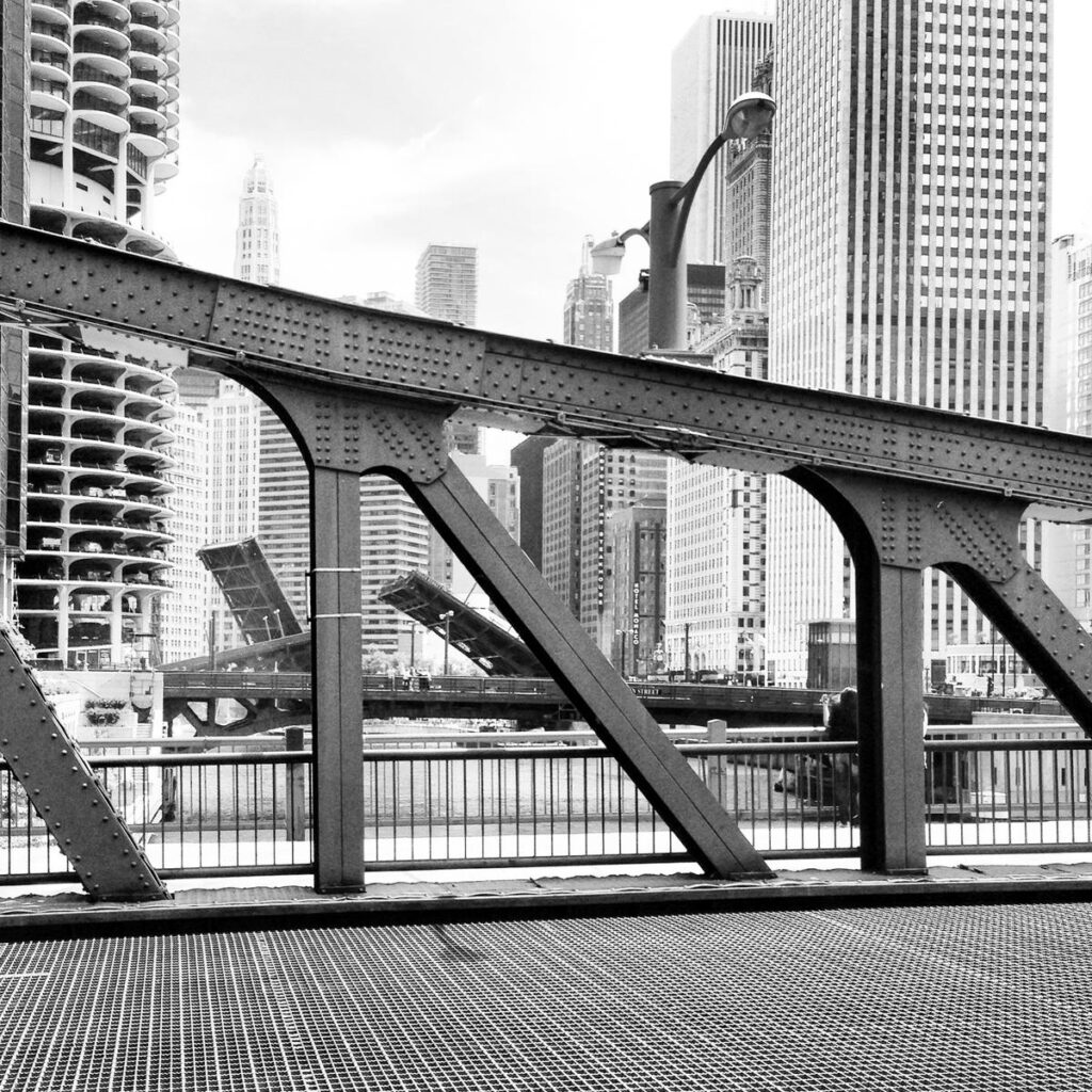 Monochrome steel truss bridge in downtown Chicago