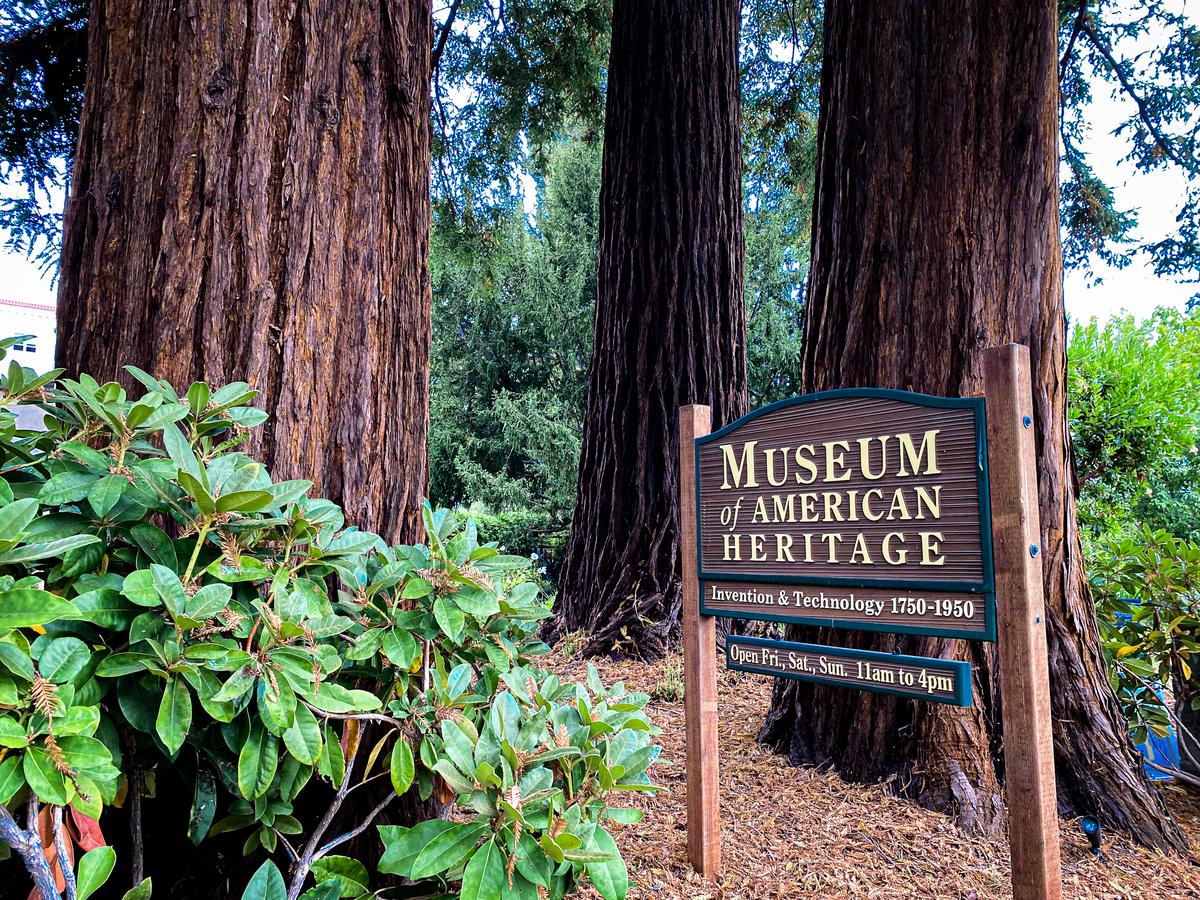 Museum of American Heritage entrance with towering sequoias in Palo Alto