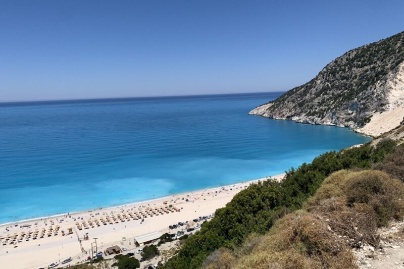 The electric blue waters and white sand of Myrtos Beach, Kefalonia, Greece