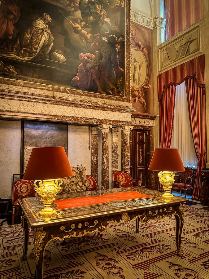Lavish interior of Moses Room, Royal Palace Amsterdam, showcasing ornate furniture and historical artworks