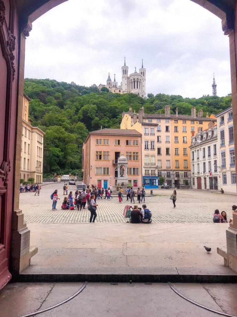 Old Lyon rooftops with Notre-Dame de Fourvière on the hill