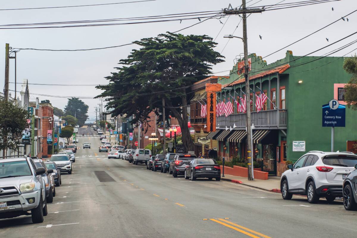 Monterey, California. Street view, architecture, traffic, and Monterey cypress trees