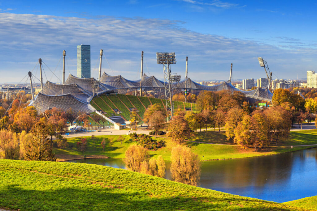 Panoramic view of Olympiapark and Olympic Lake foliage in Munich, Germany