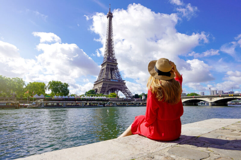 Young Traveler looking at Eiffel Tower in Paris