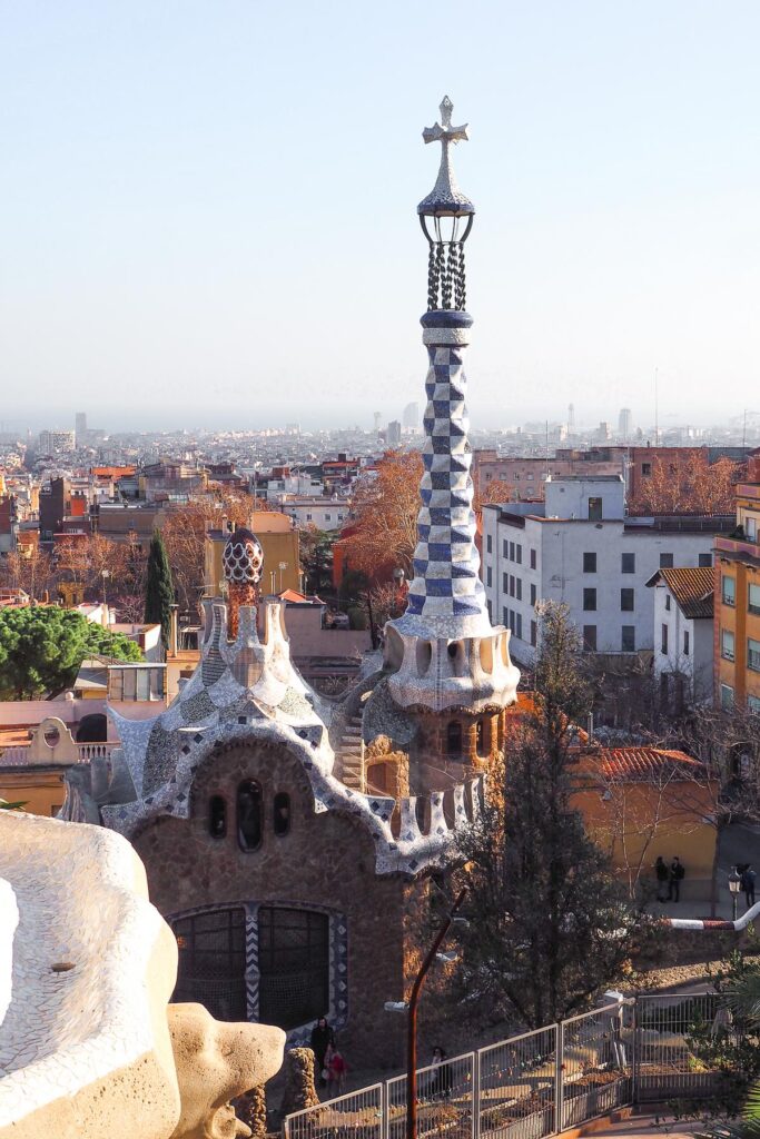 Park Güell Barcelona mosaic bench and tower against skyline
