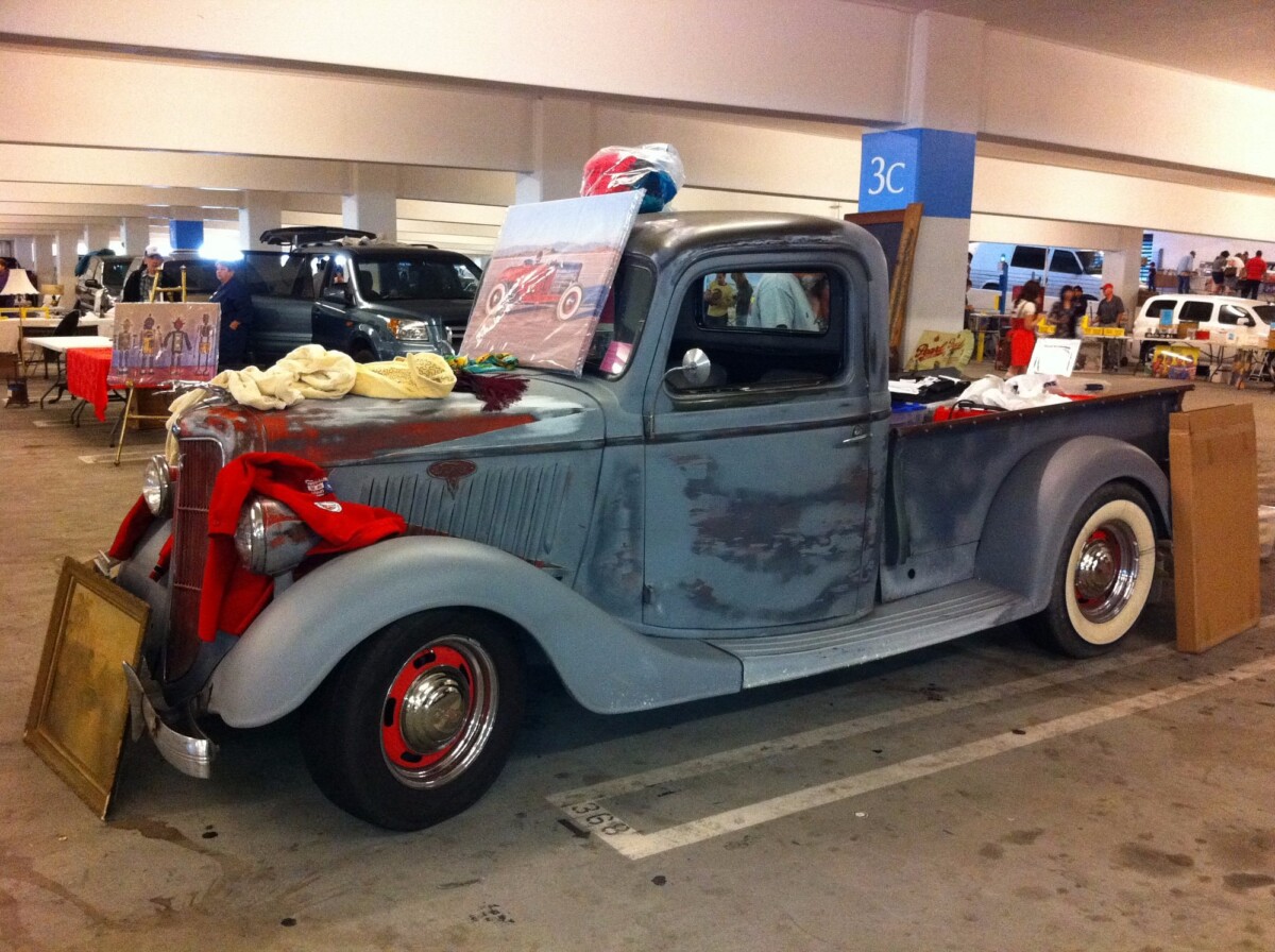 A light blue vintage pickup truck at the Pasadena City College Flea Market in Los Angeles, California