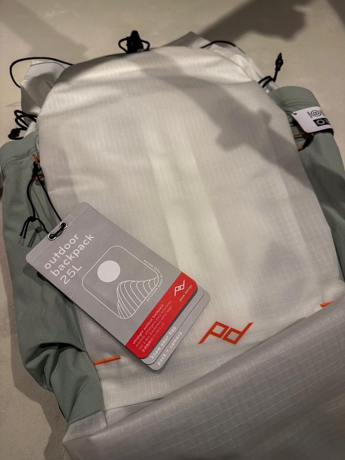 Open Peak Design Outdoor Backpack 25L showing the roll-top opening and main compartment