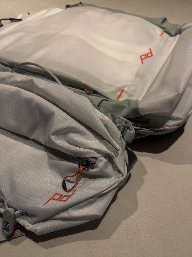 Peak Design Outdoor Backpack and sling from the Outdoor line arranged outdoors