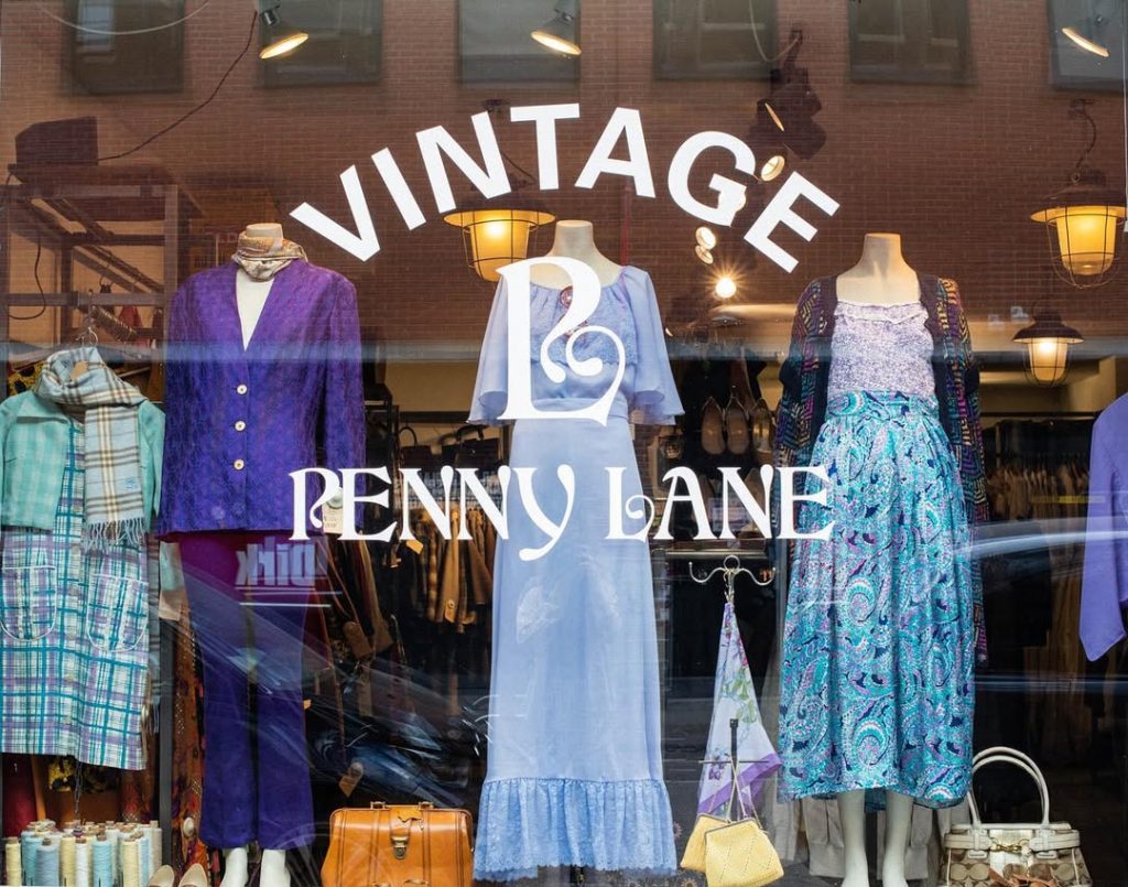 Penny Lane vintage shop window with retro mannequins, shops in Amsterdam.