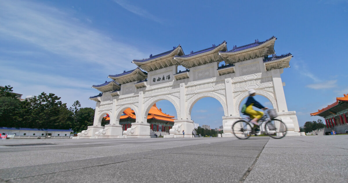 Woman Biking in Freedom Square, Taipei
