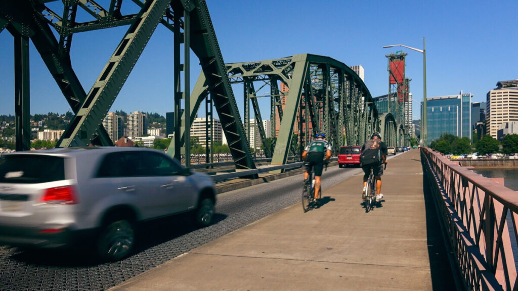 Cyclist biking in Hawthorne Bridge, Portland, Oregon