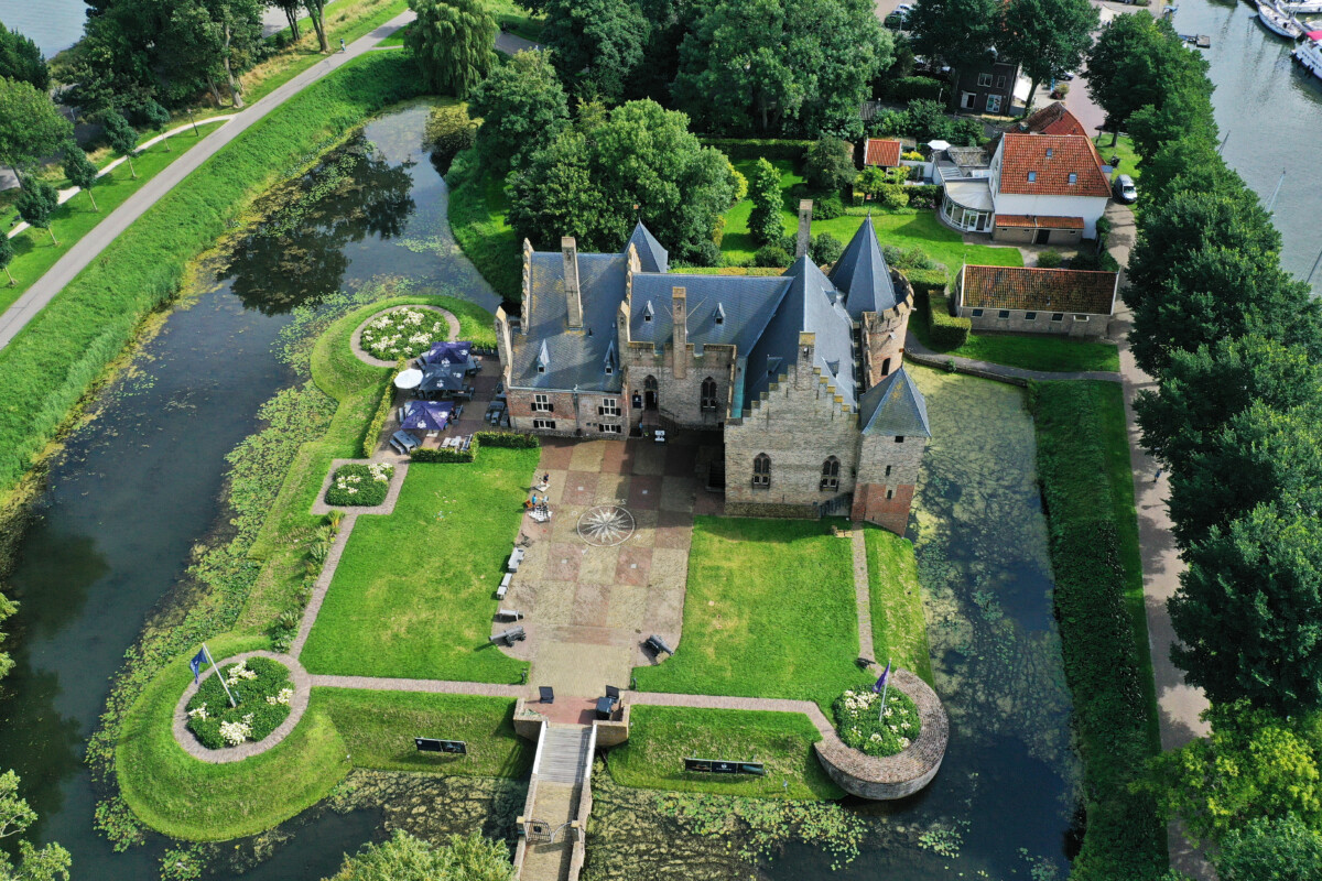 Aerial view of Radboud Castle beside Medemblik harbor