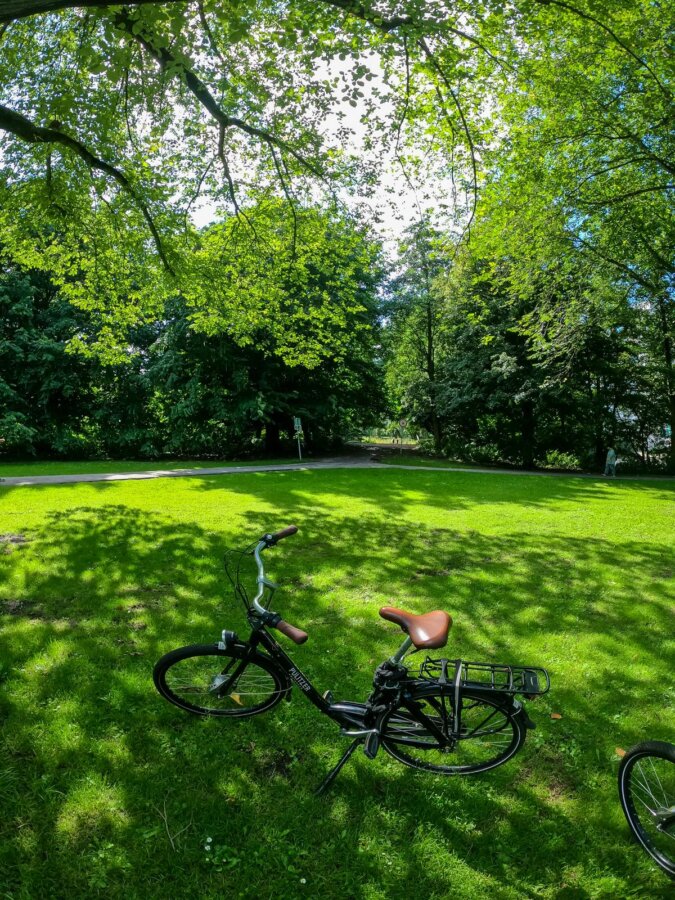 Cycling and lush greenery in Rembrandt Park, Amsterdam