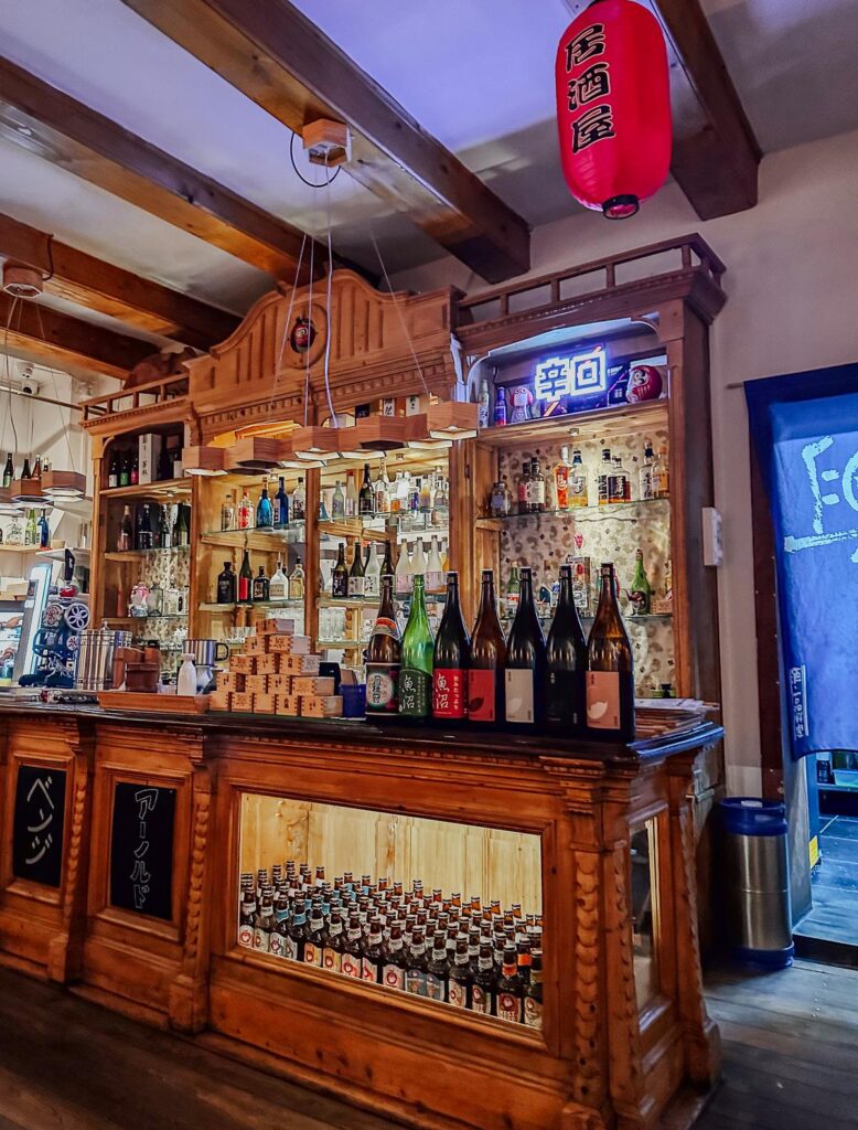 Wooden bar and Japanese decor inside Restaurant Kyo