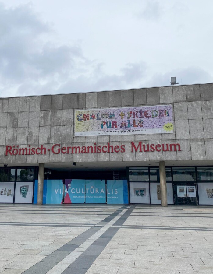 Romisch-Germanisches Museum in Cologne with Shalom Frieden banner