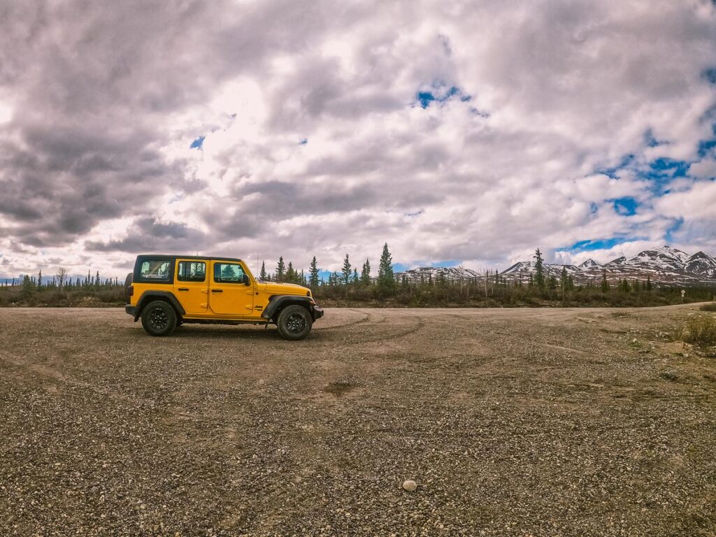 Yellow Jeep on Denali Highway, Alaska wilderness adventure (source: [HubSpot](https://blog.hubspot.com/marketing/image-alt-text))