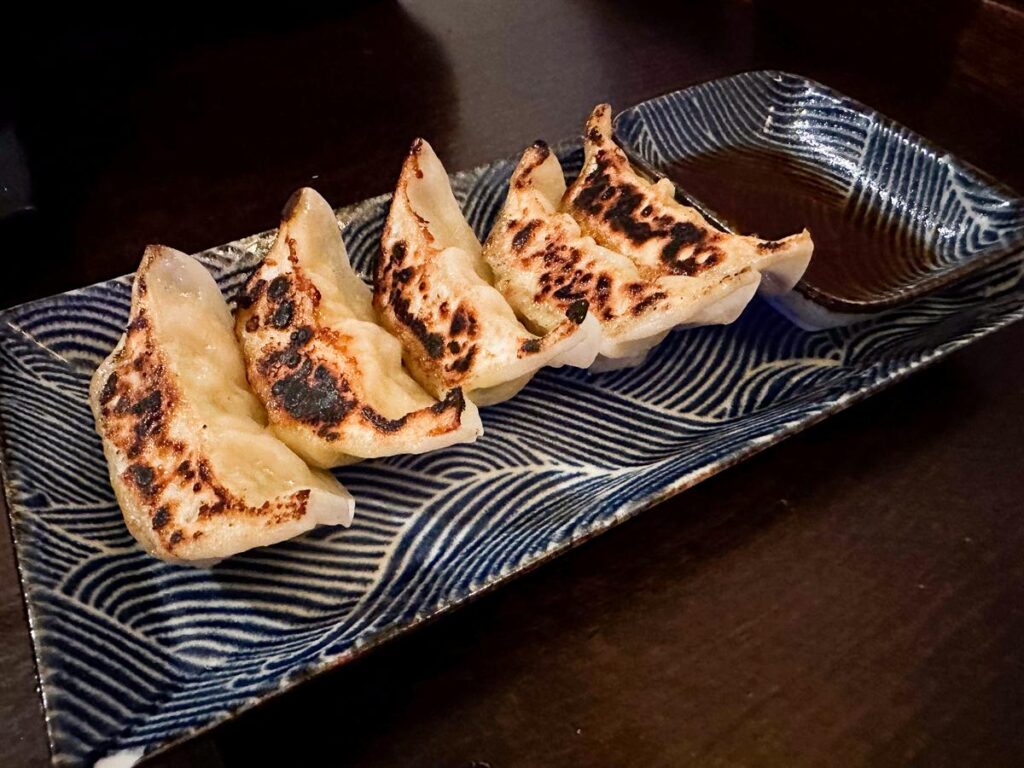 Golden-brown gyoza dumplings served at Restaurant Kyo