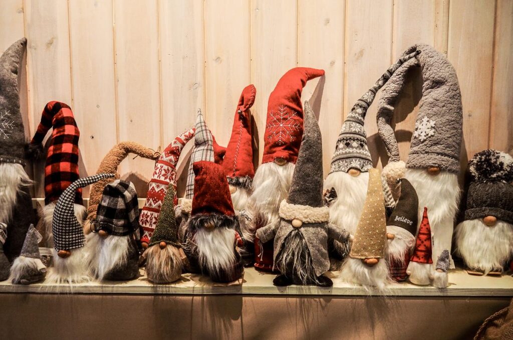 Scandinavian Christmas gnomes in festive designs for holiday home decor at Gladje Shop, Lindstrom.