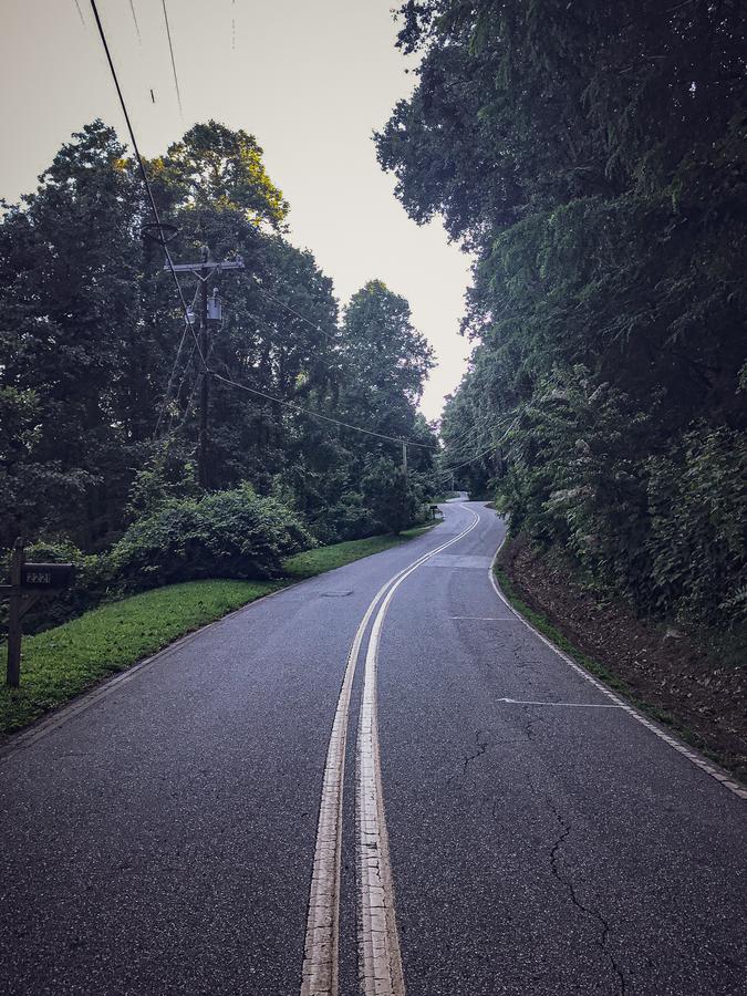 Blue Ridge Parkway winding through forested mountains in North Carolina