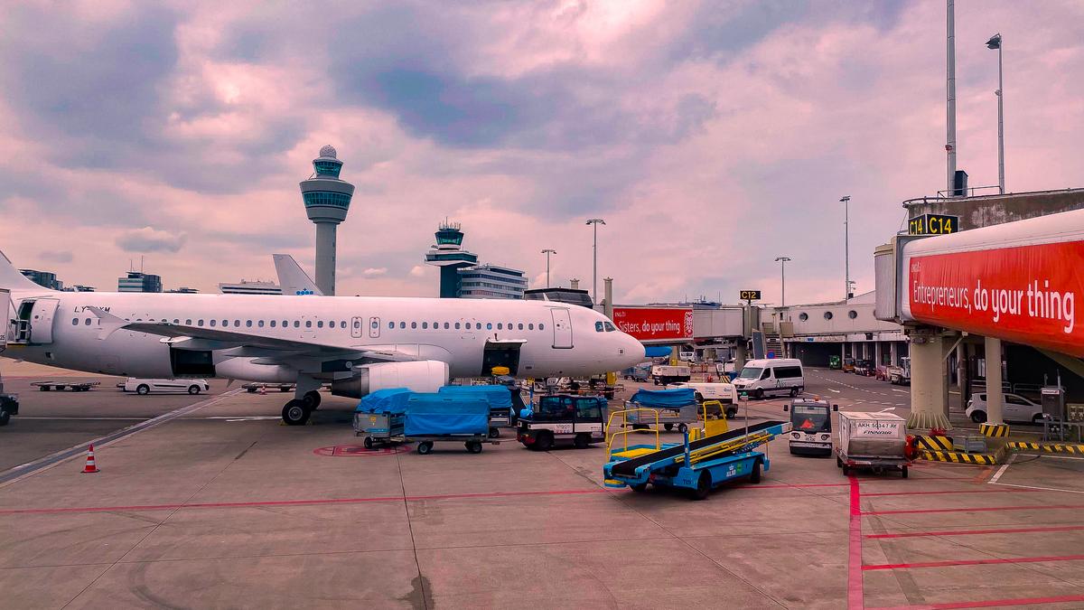 Busy departure preparations at Schiphol International Airport, Amsterdam