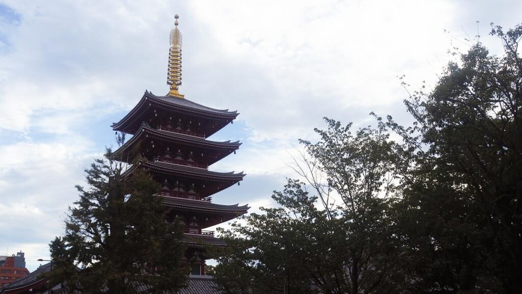 Senso-Ji Temple's iconic five-story pagoda in Tokyo, Japan: a historic and cultural must-visit landmark.