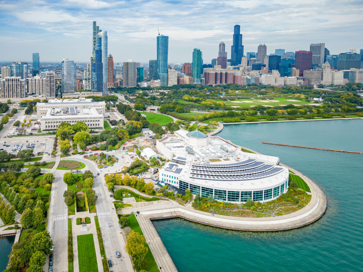 Aerial view of the Shedd Aquarium building and downtown Chicago