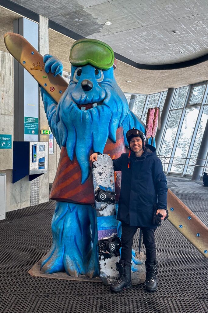 Kyle Kroeger and mascot at Stubai Glacier, Austria in color photography