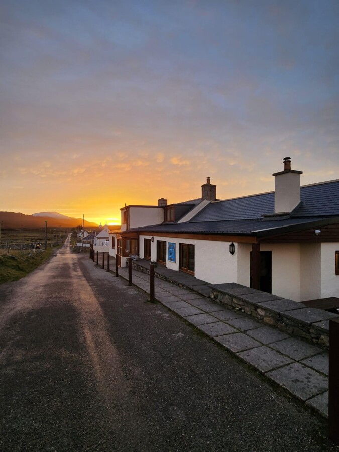 Sunset view and the exterior of Smoo Cave Hotel