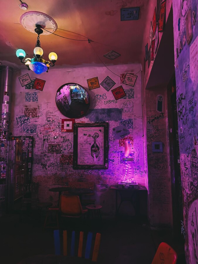 Szimpla Kert Budapest ruin bar interior with eclectic decor and vibrant ambiance.