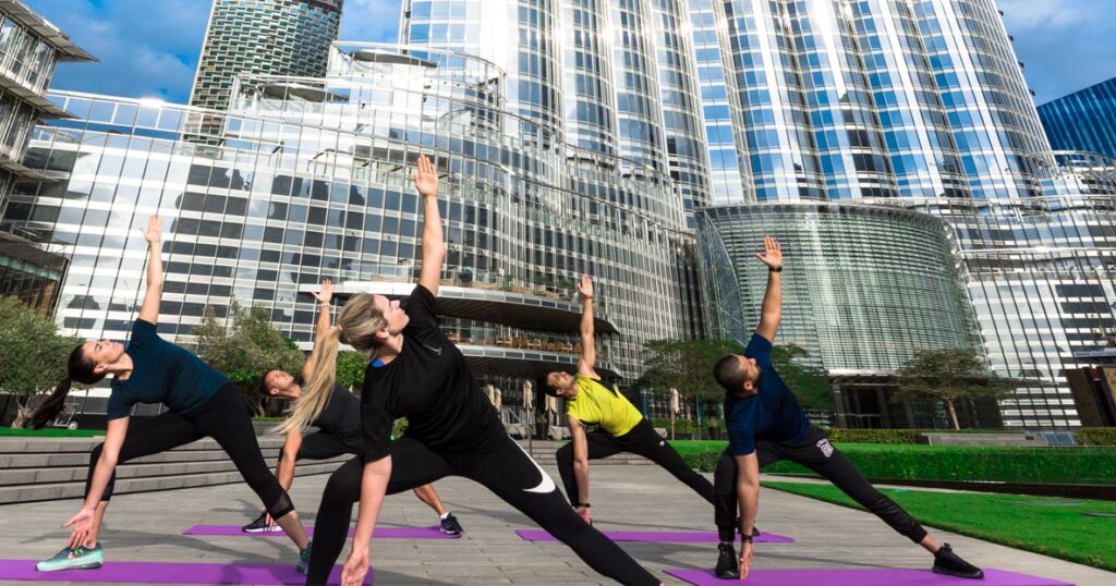 Fitness instructor and members in The Burj Club