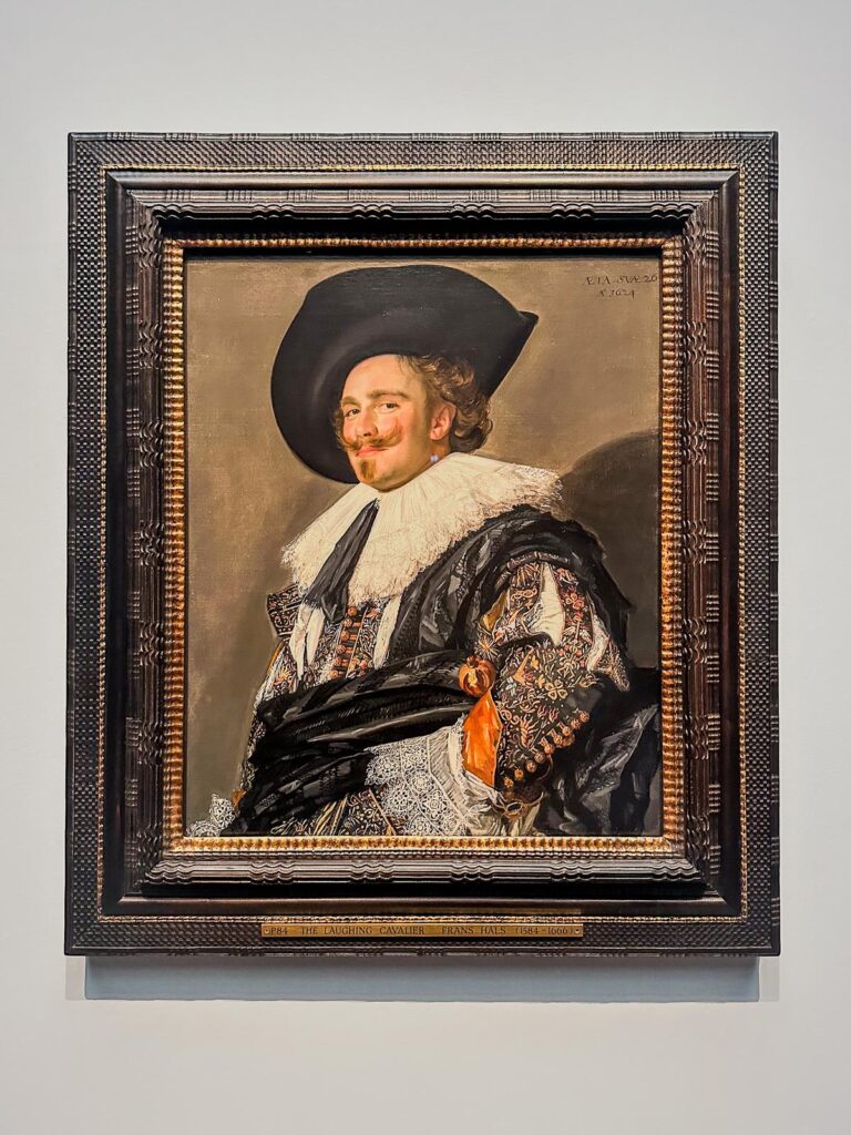 The Laughing Cavalier by Frans Hals, 17th-century Dutch masterpiece portrait in a museum exhibit
