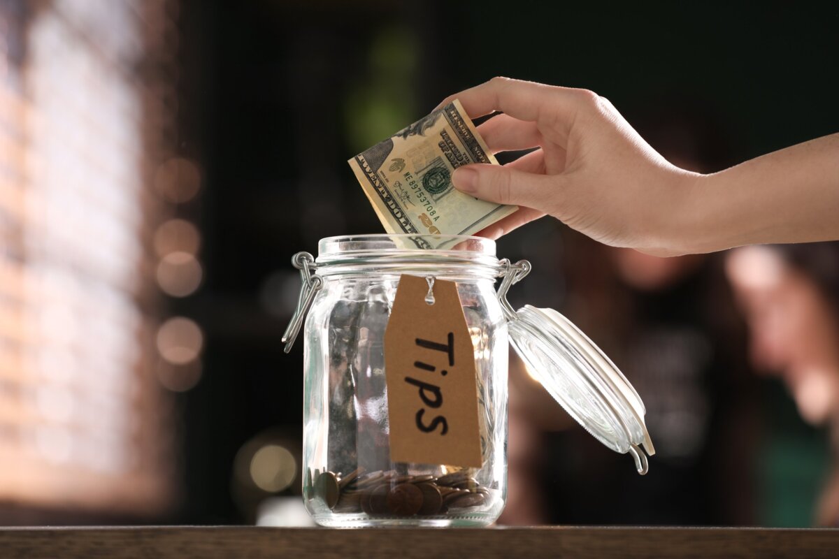 Putting money on a Tips Jar