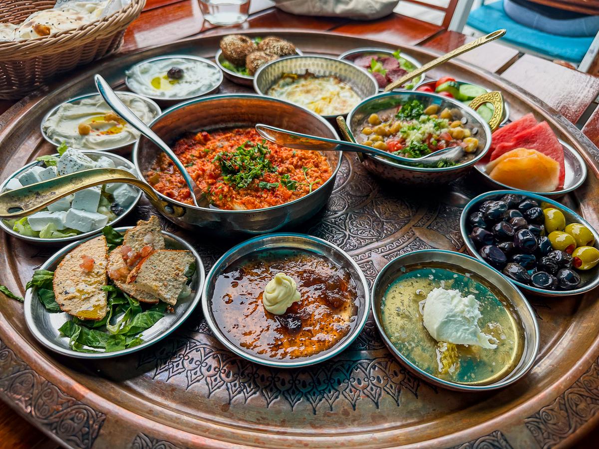Traditional Turkish and Lebanese brunch spread at ZouZou Restaurant in Dubai showcasing vibrant Mediterranean cuisine