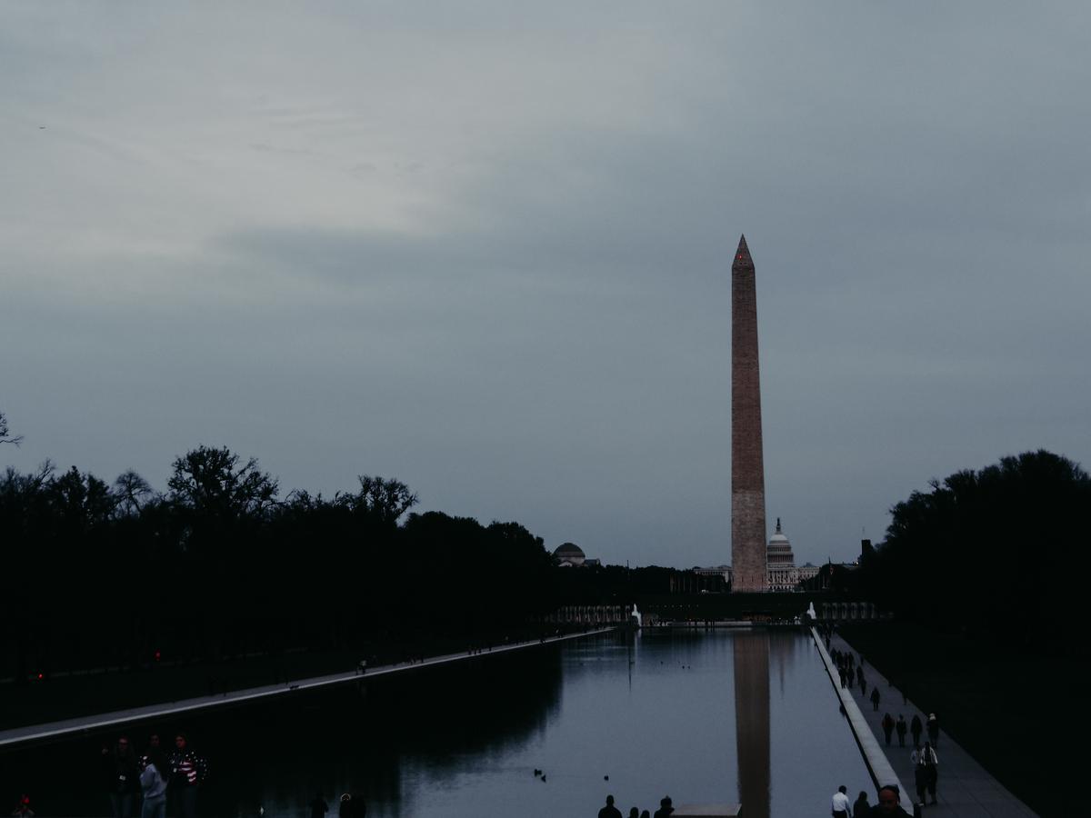 Twilight view of Washington Monument reflecting in pool at National Mall