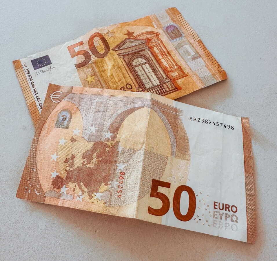 Two 50-euro banknotes showing security details