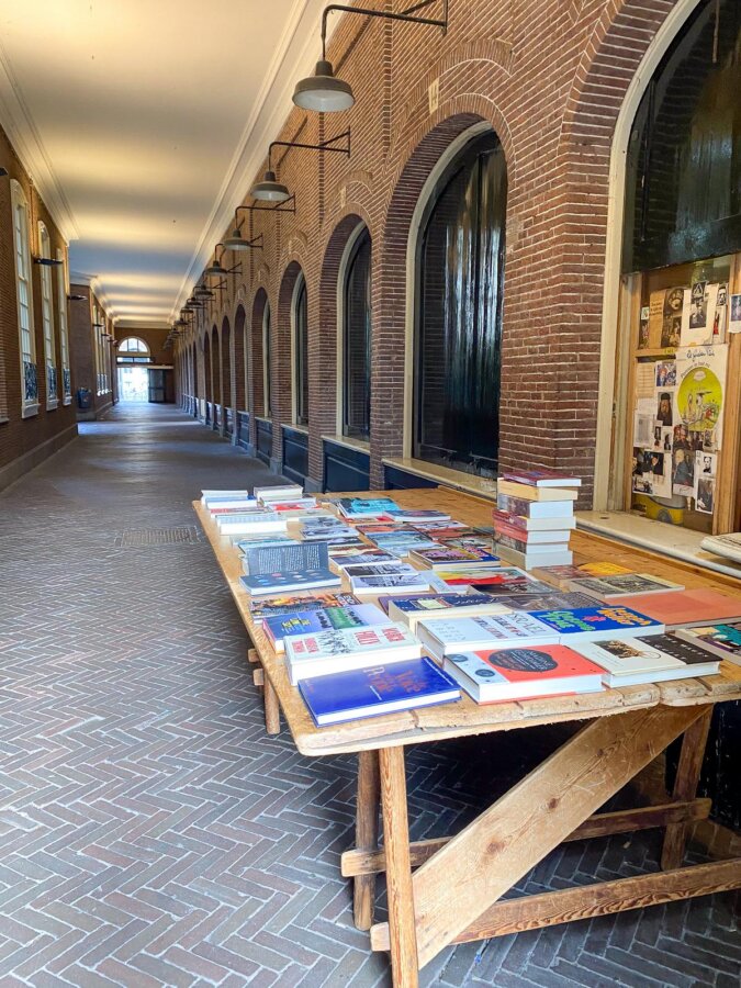 Historical Oudemanhuispoort passage at University of Amsterdam with book sale