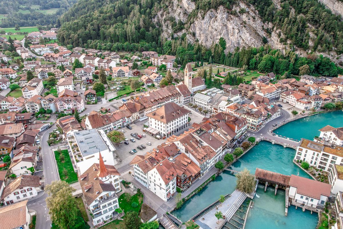 Aerial panorama of Unterseen, Swiss Alps, showcasing its vibrant landscape and architecture