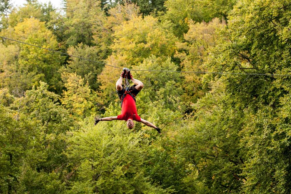 Upside-down rider on one of the best zip lines in Germany.
