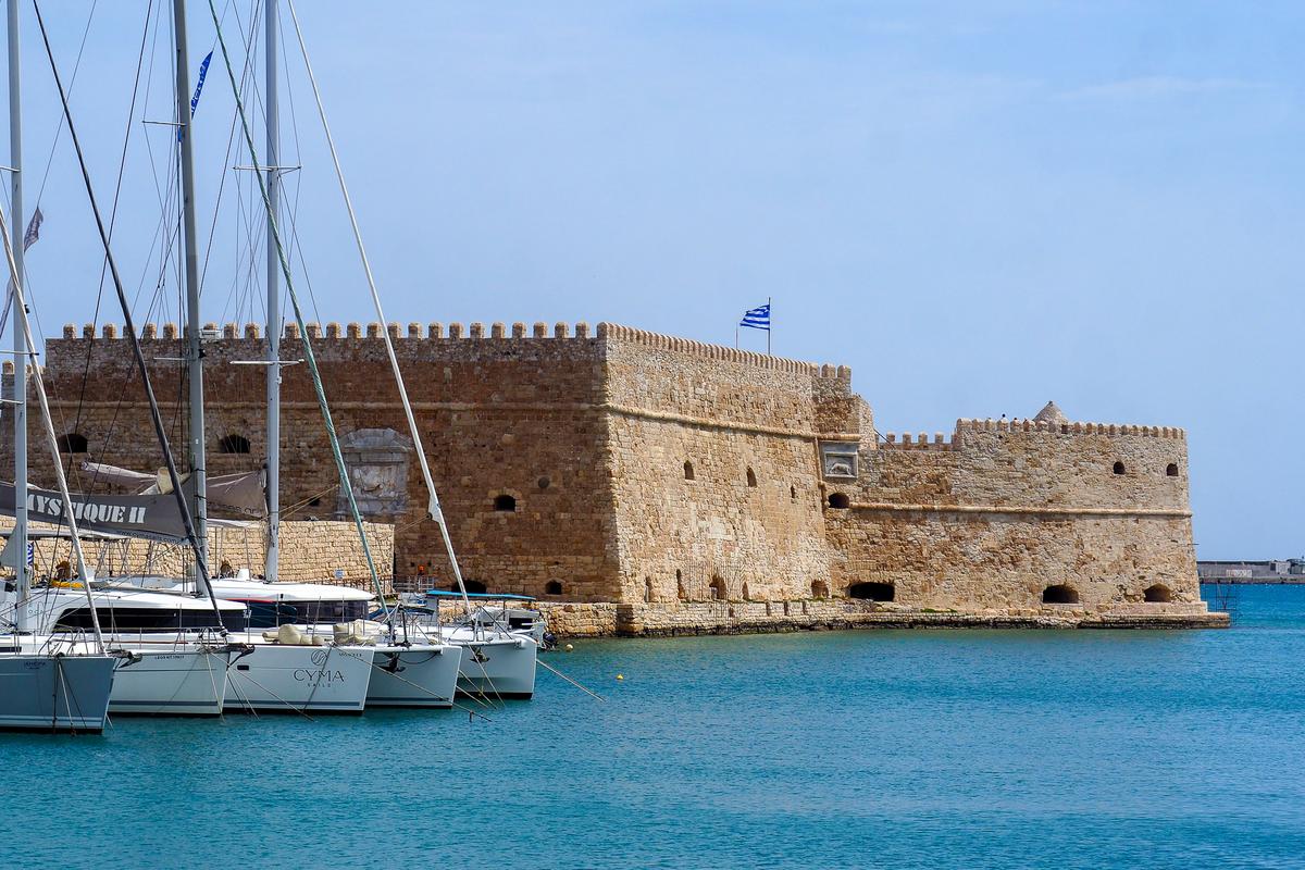 Venetian Koules Fortress in Heraklion, Crete, Greece with vibrant blue sky