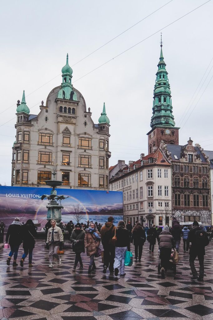 Crowds and storefronts along Strøget in central Copenhagen