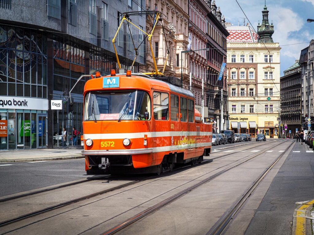 Vintage orange tram 5572 in Prague's historic streets