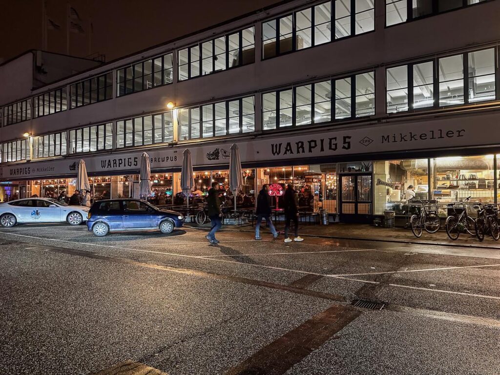 WarPigs Brewpub entrance in Copenhagen's Meatpacking District at night