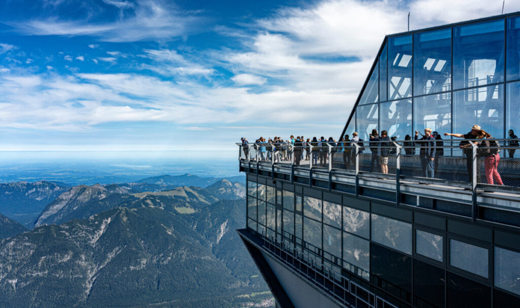 Visitors on the viewing terrace at the Zugspitze summit